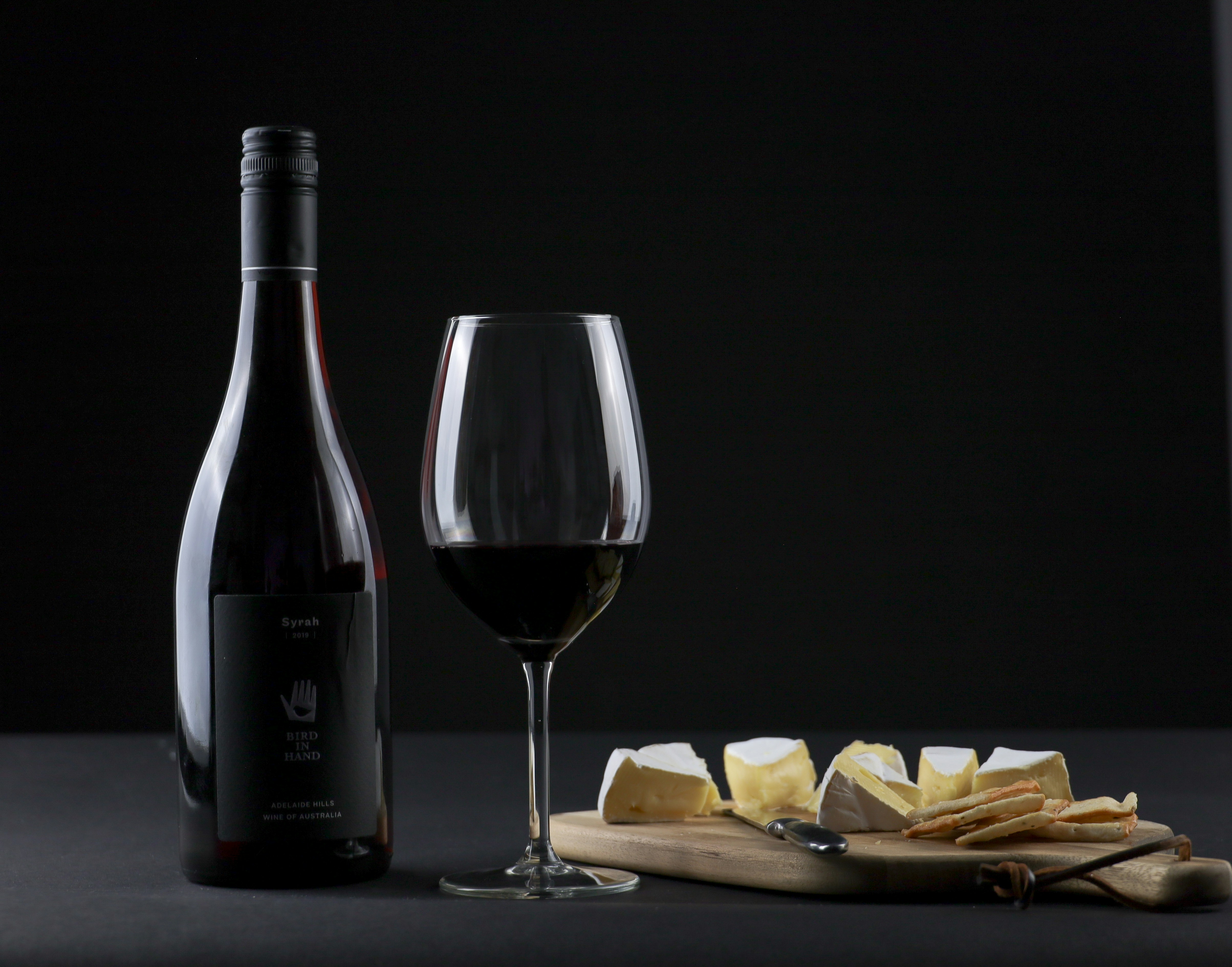 Wine pairing with candlelit dining table